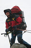 ancat > neil battles the high wind near gardnier hut