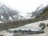 ancat > the debris from the avalanche can be seen across the hooker glacier in the distance