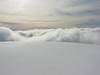 ancat > the snow and clouds blend into one.